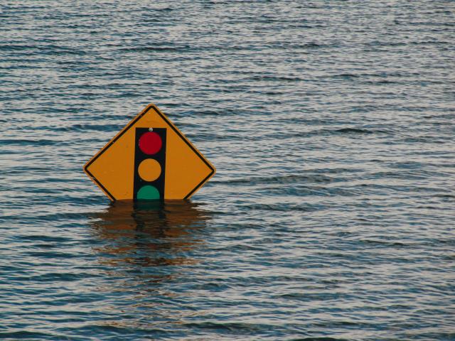 flooded intersection sign